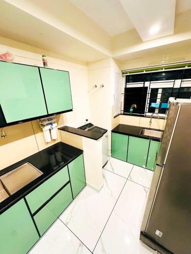 keuken, m² 2 slaapkamer, 2 privé badkamer Vrijstaande woning in Puduppadi (DEEVS Appartments landmark village ) in Puduppadi