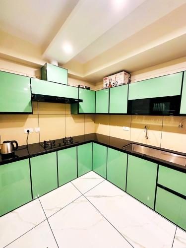 keuken, m² 2 slaapkamer, 2 privé badkamer Vrijstaande woning in Puduppadi (DEEVS Appartments landmark village ) in Puduppadi