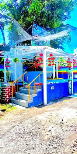 Swimming pool, DMI Hotels & Apartments Tabaco Albay by RedDoorz in Tabaco