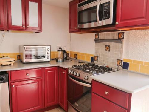 キッチン, Villa Spinoza- Lux Pool, Garden, Retreat & Beach in グアナ ベイ