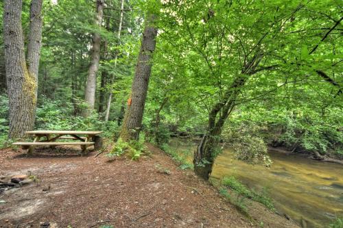 K6 Lodge Gather around the firepit soak in the hot tub and splash in the creek in Blue Ridge, USA