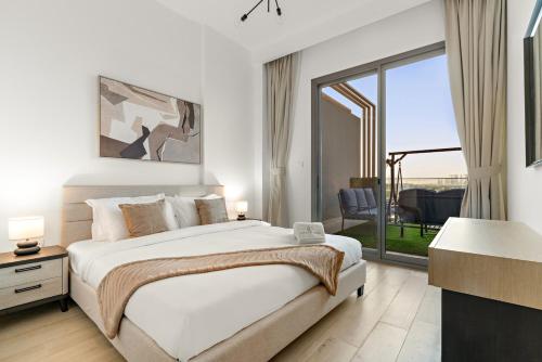 Bright 2BR Retreat Balcony & Pool Near Jumeirah Village Circle