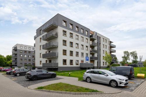 Unterkunft von außen, Przestronny Apartament w Zielonej Okolicy Parking by Noclegi Renters in Sosnowitz