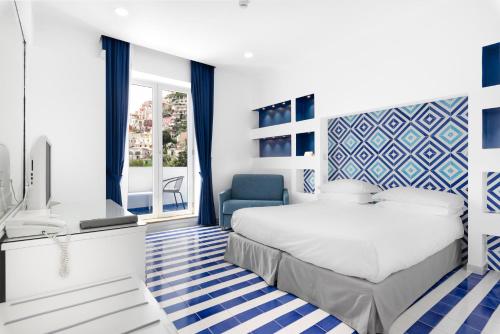 โรงแรมบูแก็งวีล (Hotel Bougainville) in โพสิตาโน่