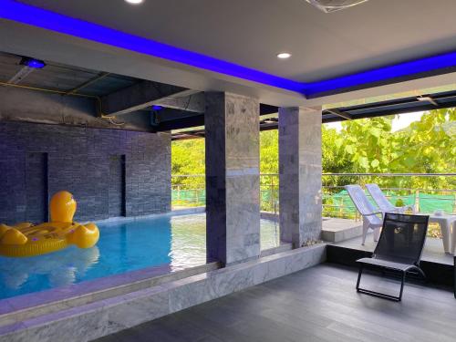 Swimming pool, Happy Hotel Aonang near Bull Muay Thai Krabi Thailand