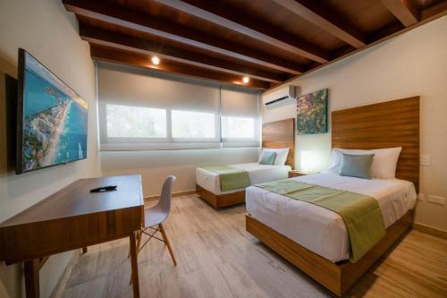 Luxury 2 Bedroom Condo - Infinity Pool at AWA Residences in Playacar, AWA 107 in Playa del Carmen, Mexico
