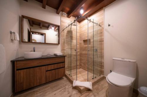 Luxury 2 Bedroom Condo - Infinity Pool at AWA Residences in Playacar, AWA 107 in Playa del Carmen, Mexico