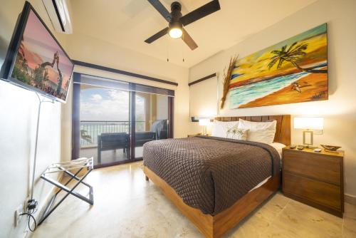 Condo Surf 405 - Luxury Oceanview Beachfront 3 BR with Gym - At El Faro Condos in Playa del Carmen, Mexico