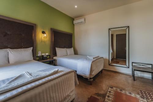 Deluxe Double Room with Two Double Beds room in Hotel Boutique La Casona by Kavia