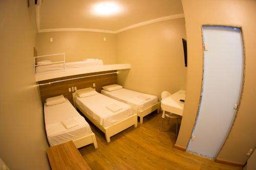 3 twin beds, 1 bunk bed