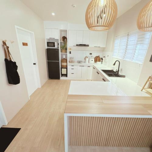 Kitchen, Private 2BR Unit | Netflix, WiFi & Comfort in Mati