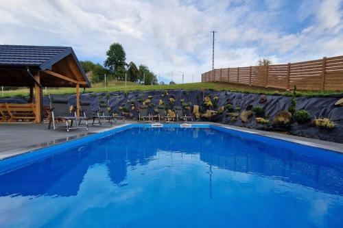 Holiday Home Wi niowa with Pool and Mountain Views, cleaning included