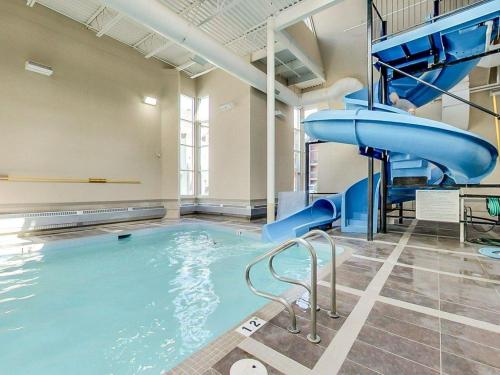 Cozy Canmore resort with mt view hot tub and pool - image 4