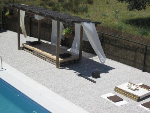 Úszómedence, Los Chozos de la Roca in La Roca De La Sierra