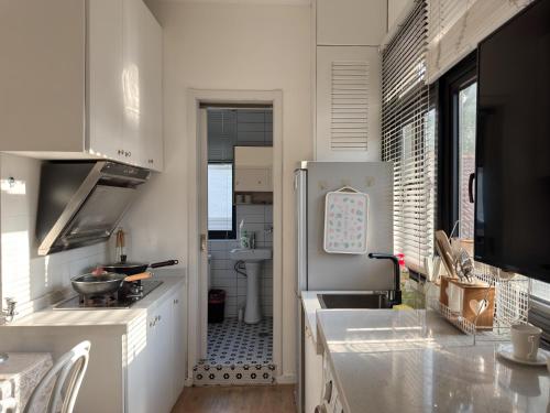 Wutong District Sunshine 2 bedrooms 2 beds with kitchen and bathroom, laundry and cooking, close to Zhongshan Park business district Leyihome close to Zhongshan Park, Šanghaj (fotografie 10)