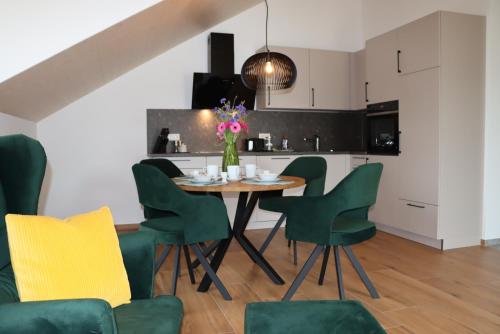 Konyha, cozy cube 1, nah an der Messe München den Bergen und Seen (cozy cube 1 Luxury Apartments, nah an der Messe, 30 Minuten zu den Bergen und Seen, 20 Minuten nach ) in Glonn