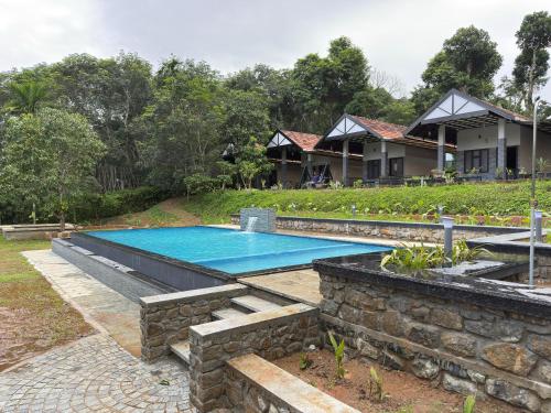 Zwembad, Meghamalhar in Kattikkulam