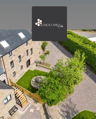 FLOUR MILL HOUSE at PITKERRO MILL, 4 double bedrooms, TVs, 3 en-suite, separate shower, wc, fully equipped kitchen, games room, large family lounge, private parking, WiFi, private garden and courtyard, long stay rates available through Honeycomb Hosts