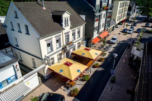 餐廳, Ferienwohnung Wiehl Sonnenterrasse in 威爾