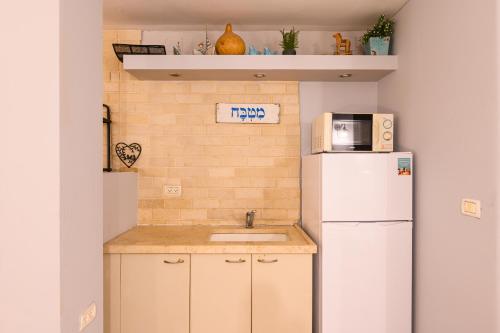 בקתות ילוז של רשת לב הגולן - 6 צימרים מקסימים עם בריכה משותפת ליד הכנרת, Javne'el (fotografie 9)