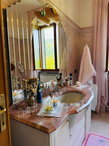 Ванна кімната, Il Giardino di Monterole Cà d'Pini (Il Giardino di Monterole Ca d'Pini) in Баньоне