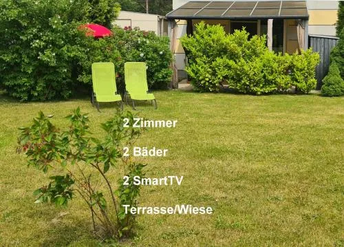 Ferienwohnung Berolina mit überdachter Terrasse Wiese 2 Zimmer 2 Bäder 2 TV in Graal-Müritz, Deutschland