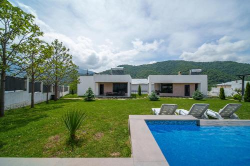 Cinema Pool & Hot Tub Luxe White Villa Dilijan