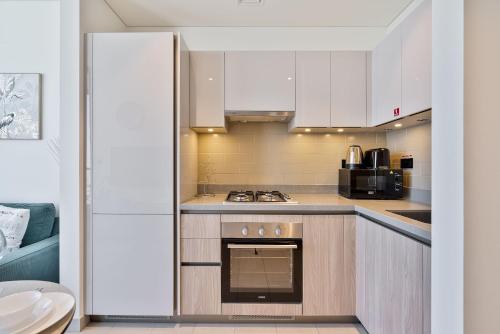 PVH - Sobha Waves - Serene 1BR minutes to Downtown - image 11