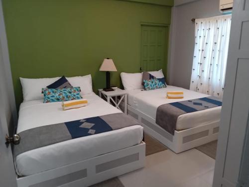 Modern Apartment near Pigeon Point with Breakfast in Kraunpointa