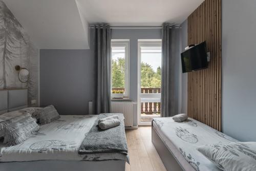 Pokoje Gościnne Szumny Lasek