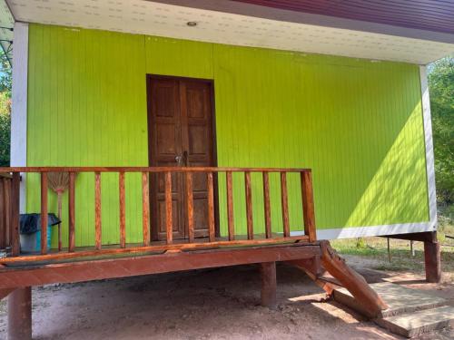 Sukanyawoodhouse near Thai sea