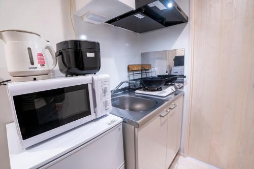 5 min walk from Gotanno station 20sqm apartment with private toilet and bathroom Direct access to popular travel destinations such as Ueno