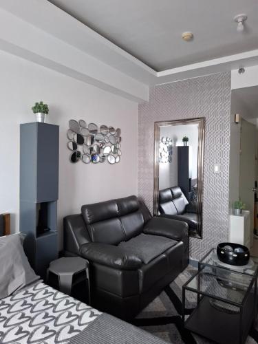 QUINS STAYCATION One Bedroom at SMDC South Residences, Manila (fotografie 3)