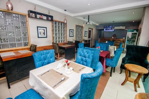 Restaurant, Elegance Suites Hotels in Somolu