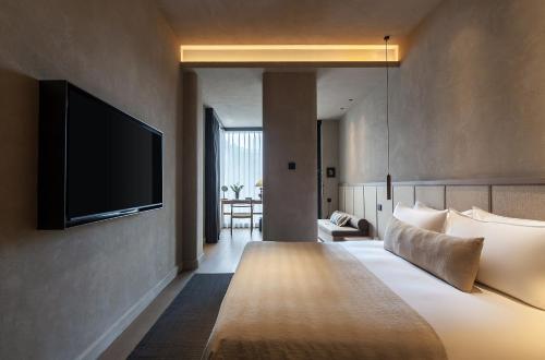 Double Room with Balcony (2 Adults + 1 Child) image 1