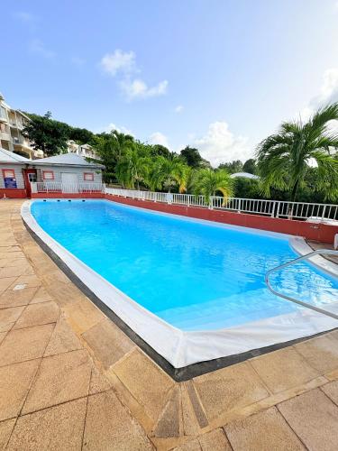 Cảnh quan, Sea view apartment, pool and beach 50m away in La Trinite