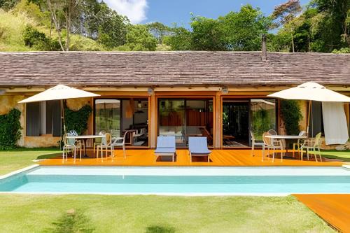 Secreto Cocheira | Piscina, jacuzzi e lago privativo @secretobangalos in 帕迪杜阿爾菲雷斯