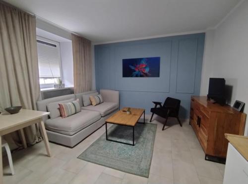 Motyl Apartamenty Studio lub pokój z łazienką