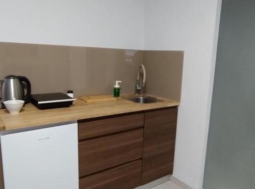Motyl Apartamenty Studio lub pokój z łazienką