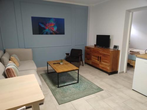 Motyl Apartamenty Studio lub pokój z łazienką