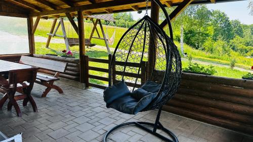Балкон/тераса, Cabana cu ciubăr din Larguta (Cabana cu ciubar din Larguta) in Holbav