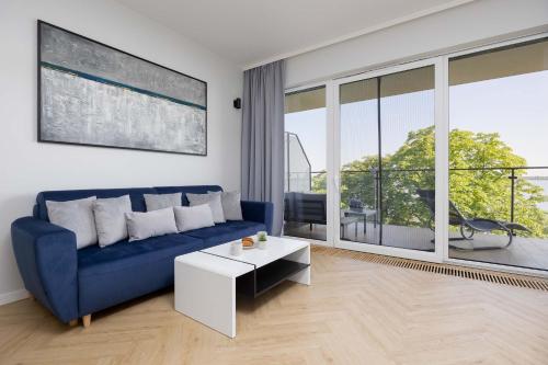 . Modern Apartment by the Lake with Parking & Sauna in Zegrze by Noclegi Renters
