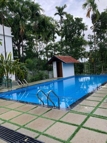 منظر, Snow white resort wayanad  in باتشيلاكادو