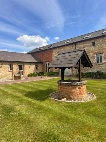 Kert, Foxes Den at Tove Valley Cottages in Heathencote