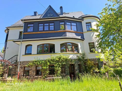 Vista exterior, ansimali 2 - 1Zimmer-Apartment mit Wohn- und Schlafraum, integrierter Kuchenzeile, separater Dusche  in Grunhain-Beierfeld