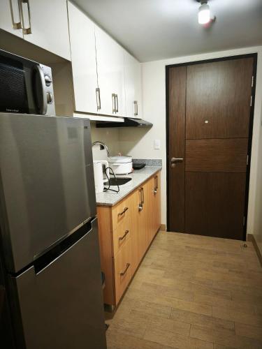 Modern Studio Condo in Heart of Quezon City, Manila