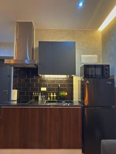 Sleek Designer Studio at Knightsbridge Residences, Manila (fotografie 7)