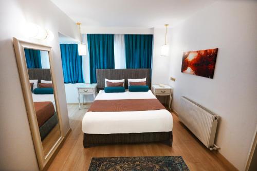 Taximtown Hotel - image 4