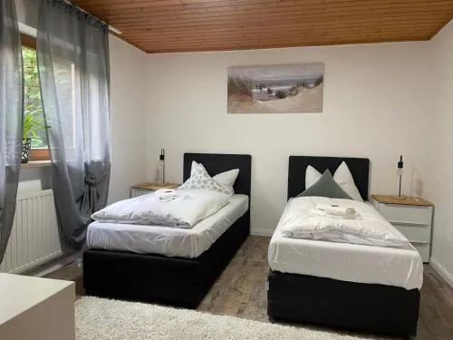 Appartio - Gästehaus "Dorfblick" - komfortable Ferienwohnungen mit Küche und Waschmaschine in Hofheim in Unterfranken, Deutschland
