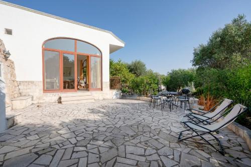 Garden, GuestHost - Il Pergolato Charming Trullo & Flat in Sorbola